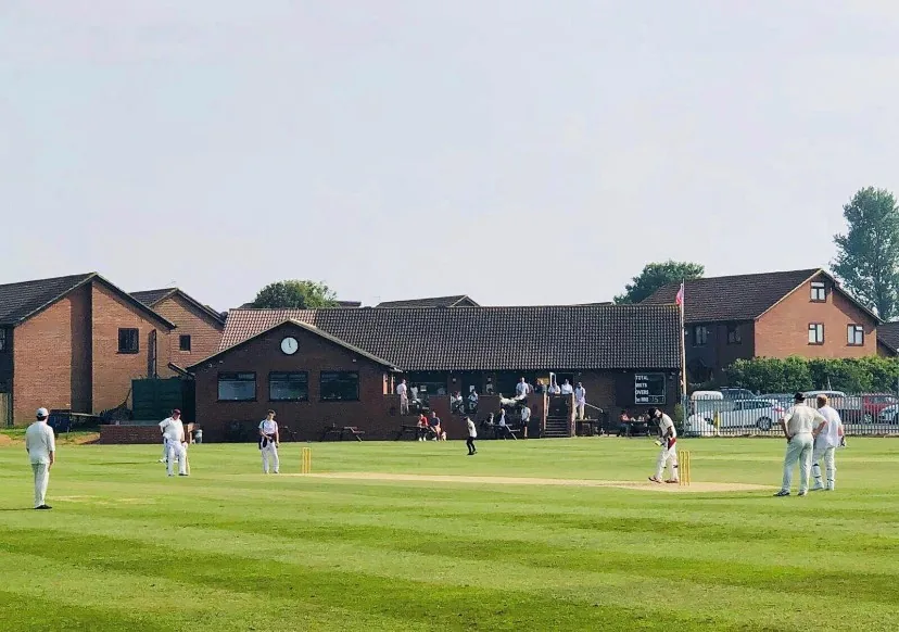 Hawkinge Cricket Club team playing on pitch