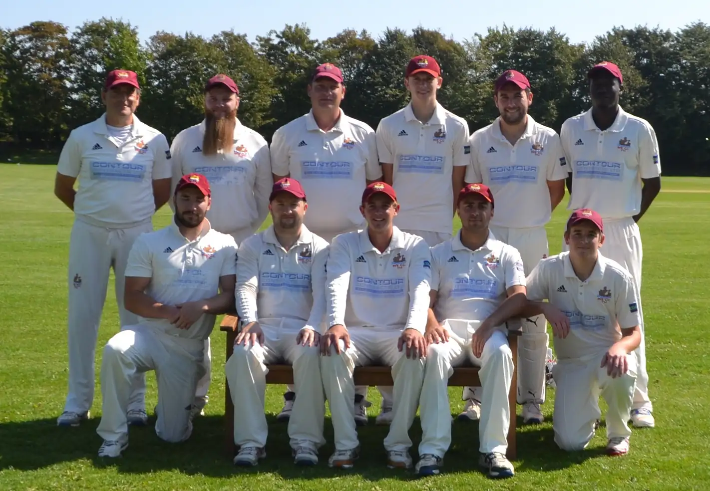 Hawkinge Cricket Club team group photo in white kit