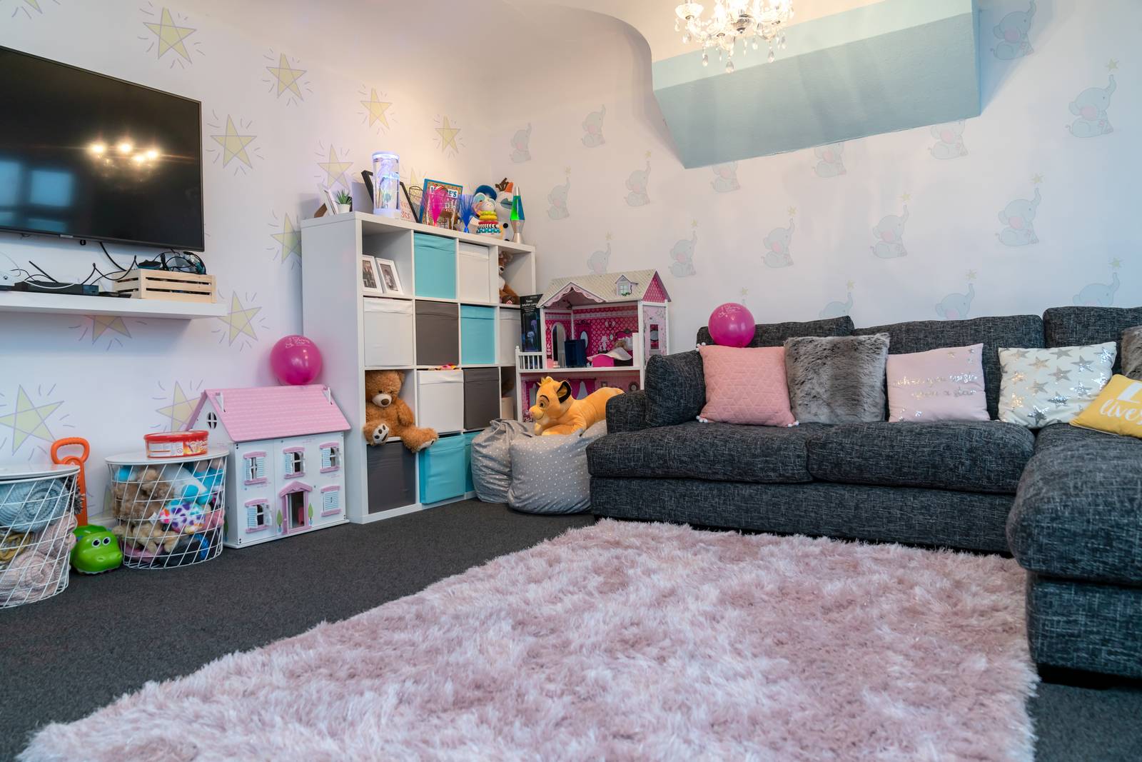 Toys and a sofa seating area in the Family Hub