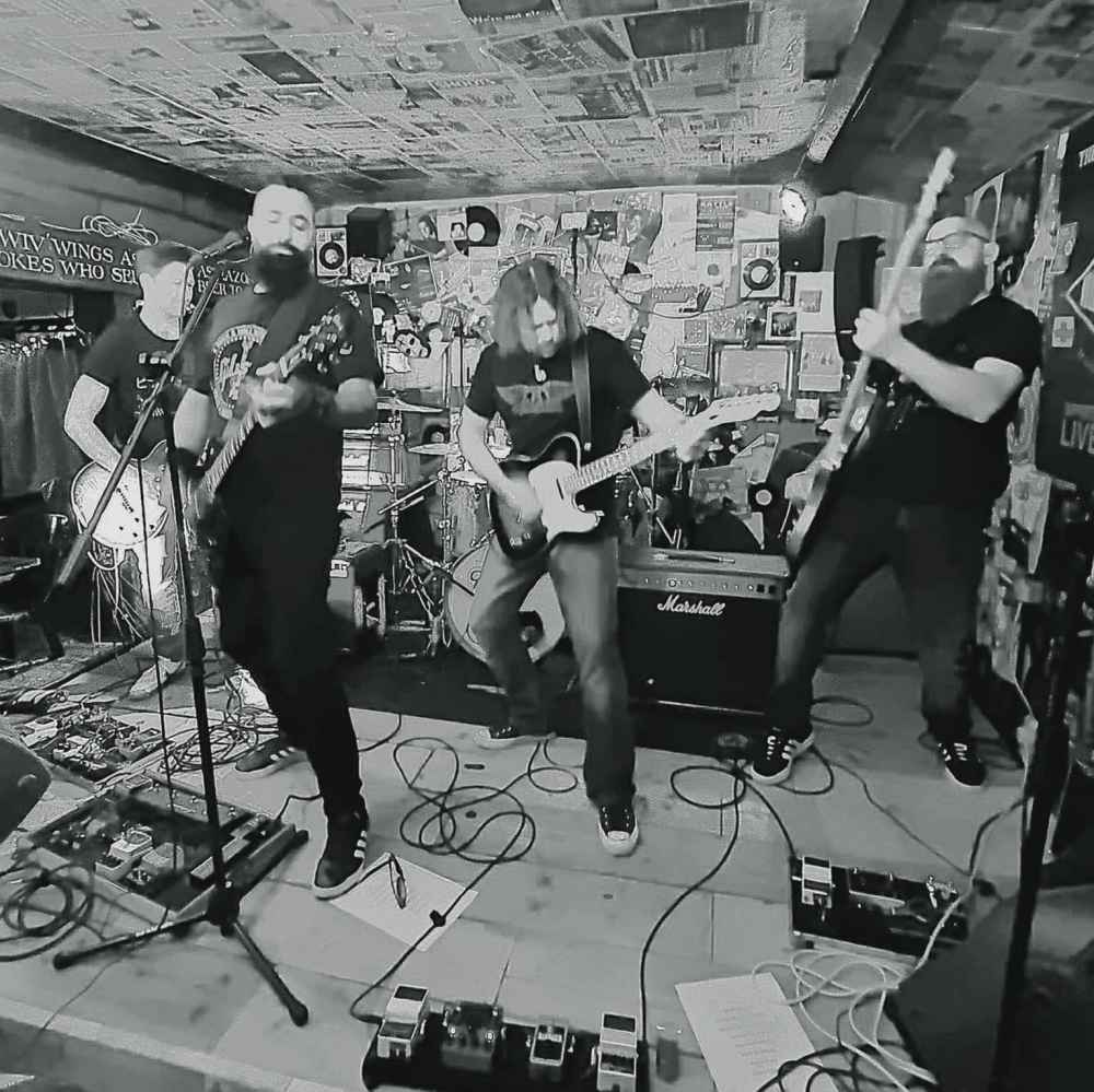 Band playing in black and white