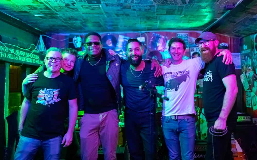 Band standing together